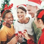 A group of co-workers celebrating Christmas in the workplace